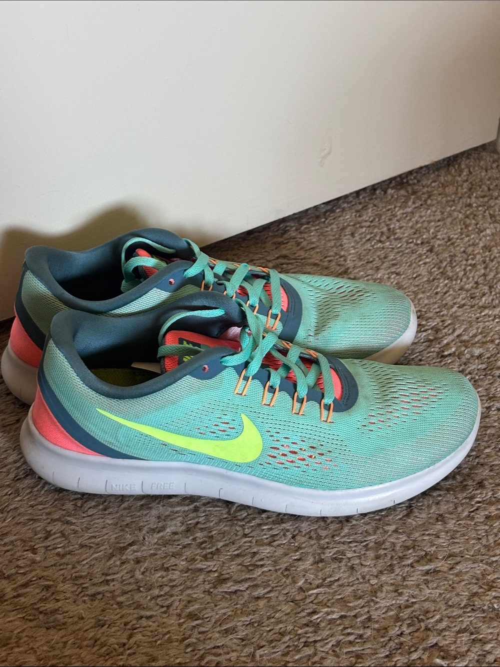 Nike Women's Mint/Teal Running Shoes with Neon Yellow Swoosh